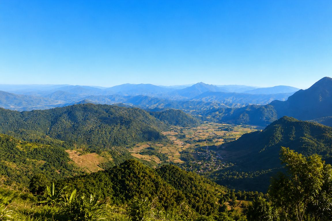 Panoramic mountain views from Phu Chi Fa in northern Thailand during a Chiang Rai Tours guided experience with our agency